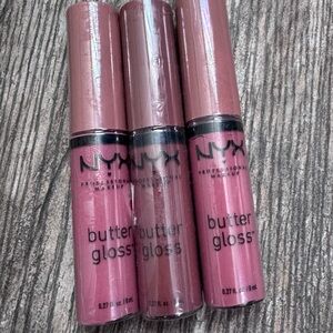 Three unopened NYX Butter Glosses, Tiramisu and Praline